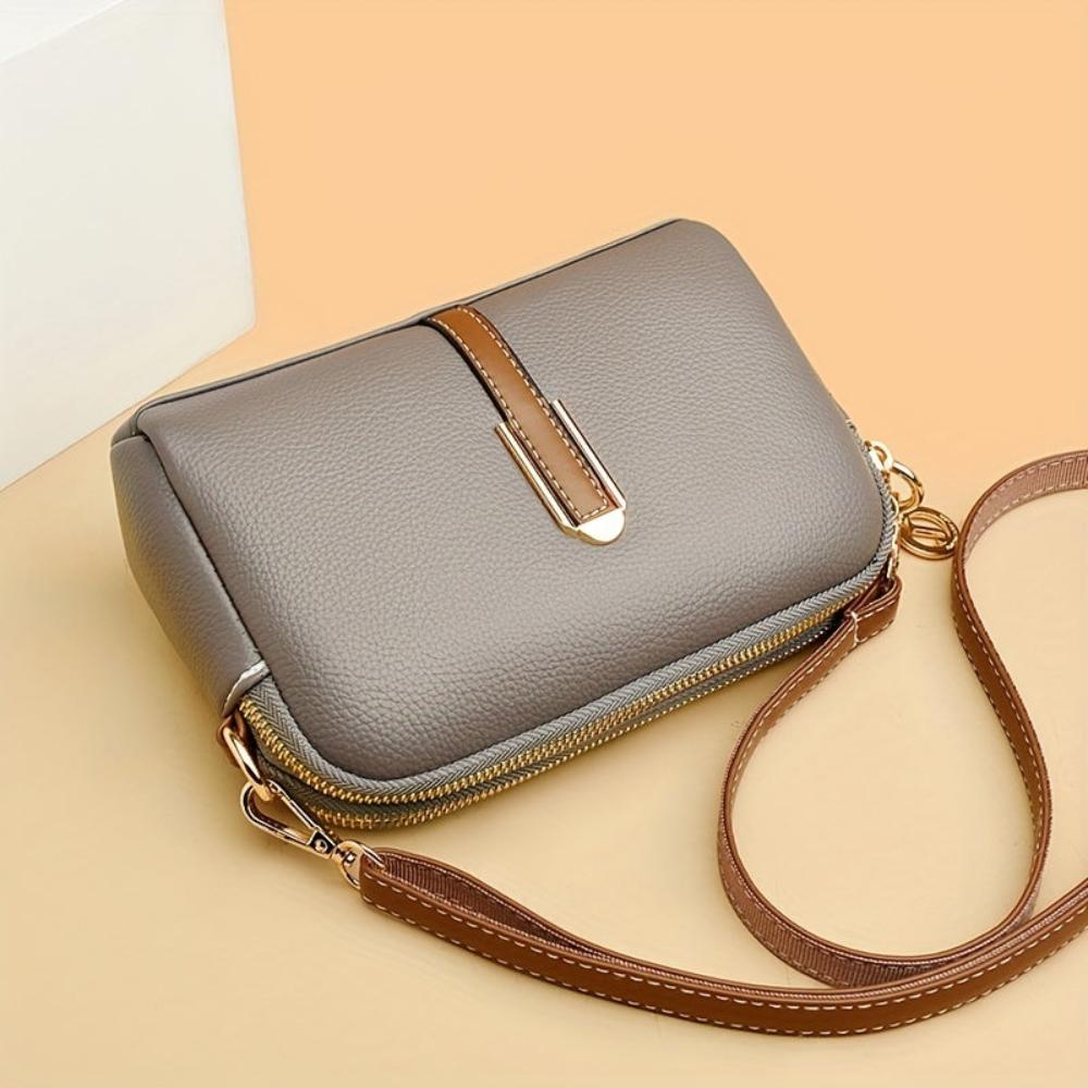 Bolso bandolera con relieve Mila Litchi