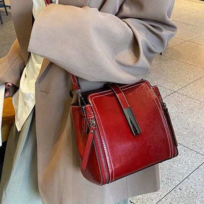 Elegante bolso bandolera de piel auténtica