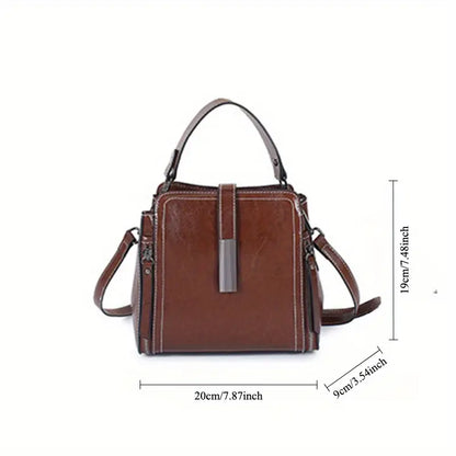 Elegante bolso bandolera de piel auténtica