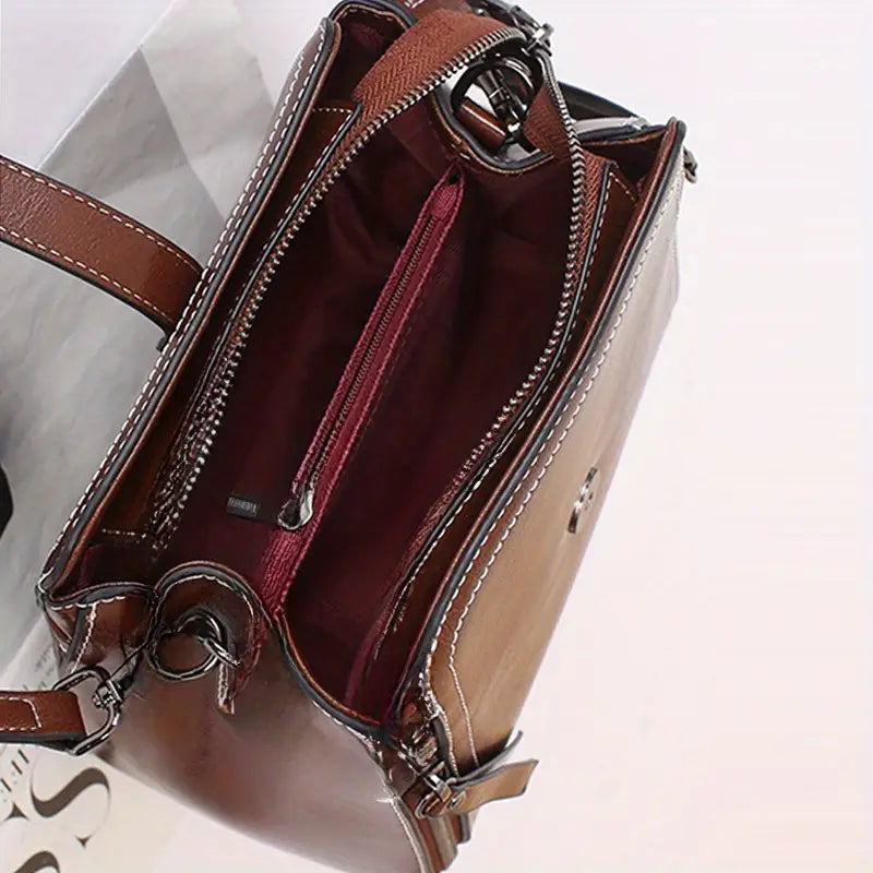 Elegante bolso bandolera de piel auténtica