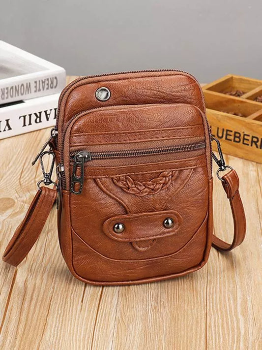 La elegancia vintage de Vellana | Bolso bandolera de cuero