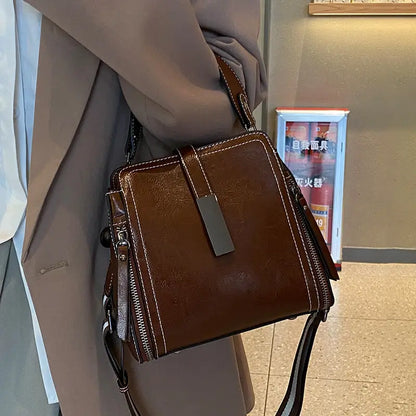 Bolso bandolera retro con correa ajustable