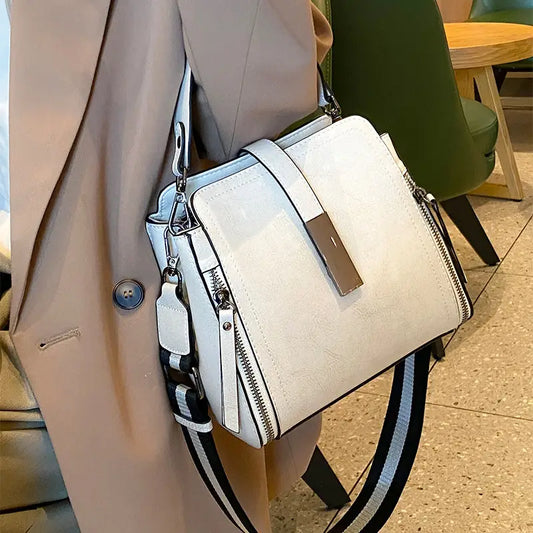 Bolso bandolera retro con correa ajustable