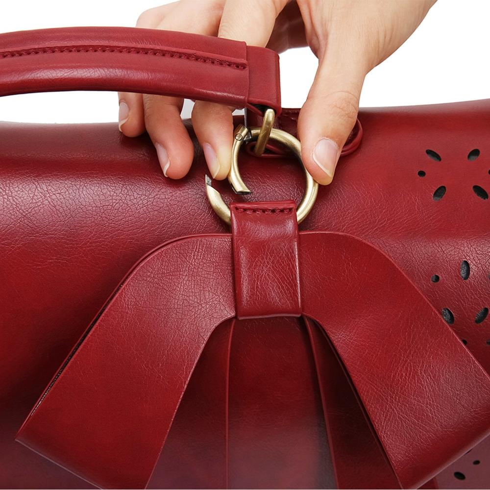 Elegante bolso tipo cartera con pajarita de Grace