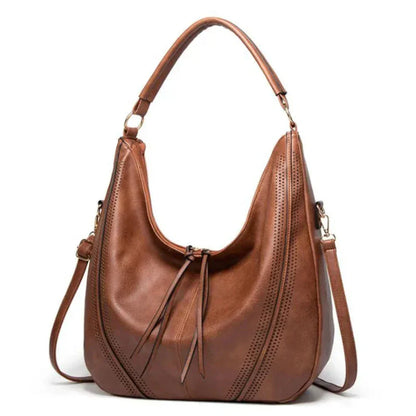 La versatilidad clásica de Minerva | Bolso vintage