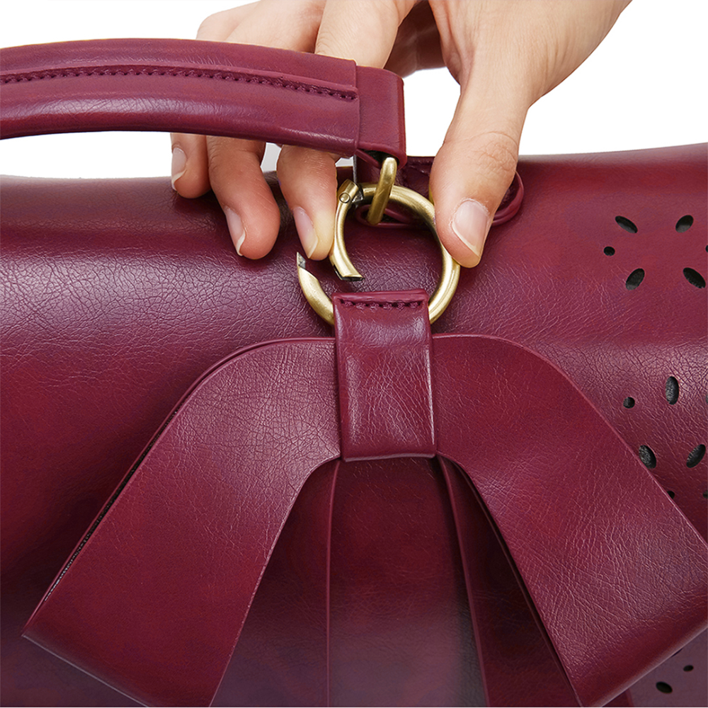 Elegante bolso tipo cartera con pajarita de Grace