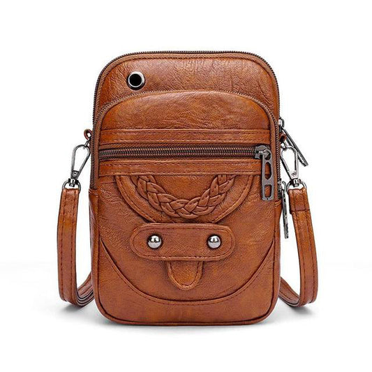 La elegancia vintage de Vellana | Bolso bandolera de cuero